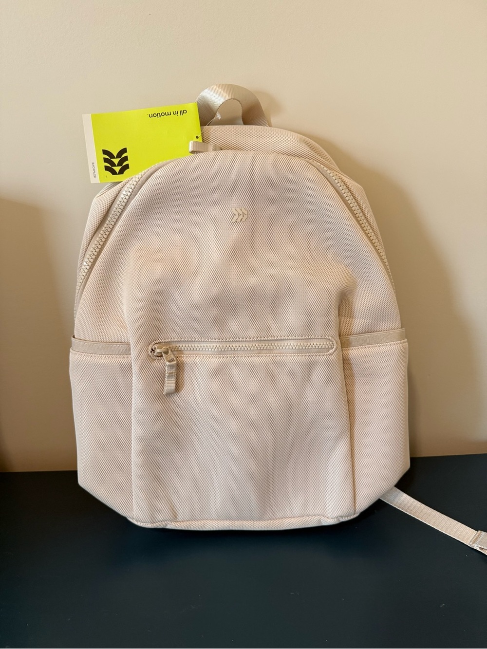 Minimalist Cream Backpack with Front Zip Pocket